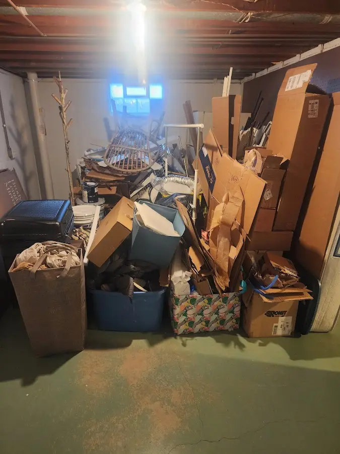 Roll-off dumpster container at job site for 20 Yard Dumpster Rental in Sealy